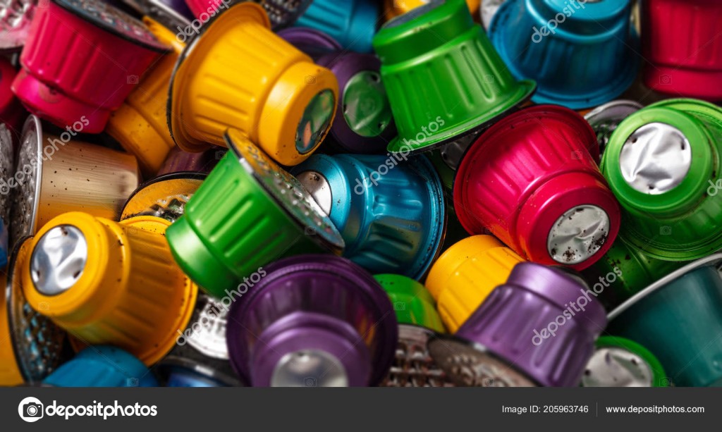 Colorful used coffee capsules background. Closeup view with details