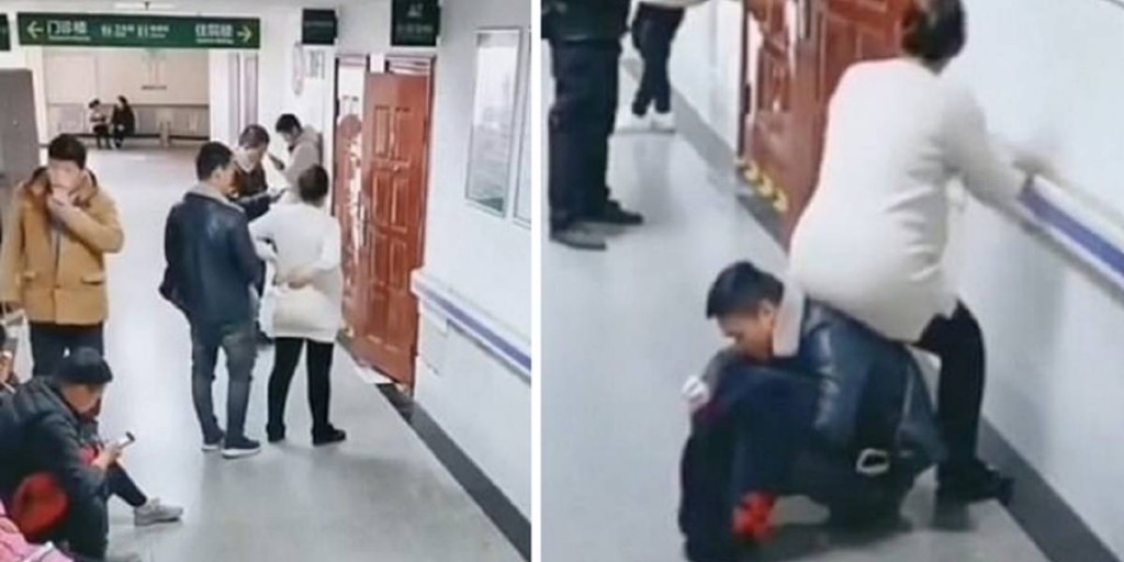 Mujer embarazada usa de silla al esposo