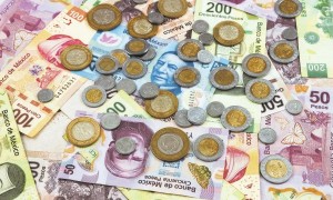 El Economista - peso dolar monedas